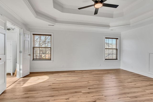 3033 Tybee Trl, Murfreesboro, TN 37127 - unfurnished bedroom with a tray ceiling, light wood-style floors, ornamental molding, baseboards, and a ceiling fan