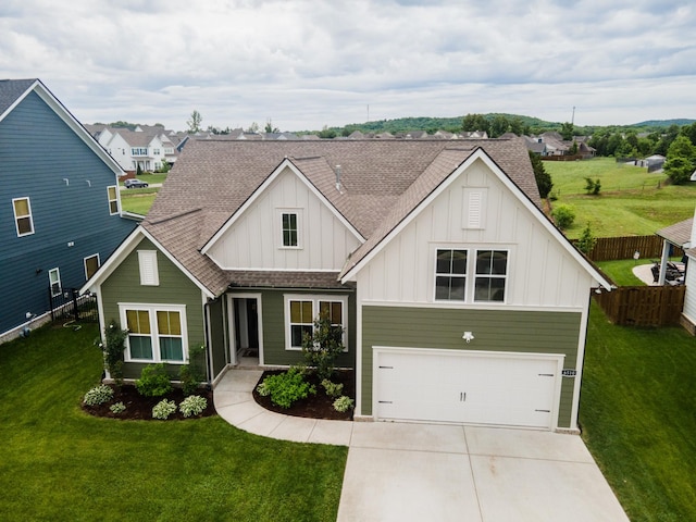 6510 Rusty Blackbird Ct, Murfreesboro, TN 37128 - view of front of property featuring board and batten siding, a garage, driveway, and roof with shingles