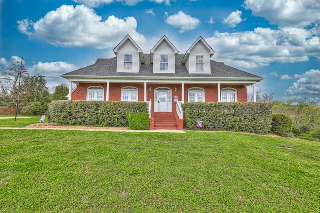 5784 Rock Springs Rd, Smyrna, TN 37167 - view of front facade featuring brick siding, a front lawn, covered porch, and roof with shingles