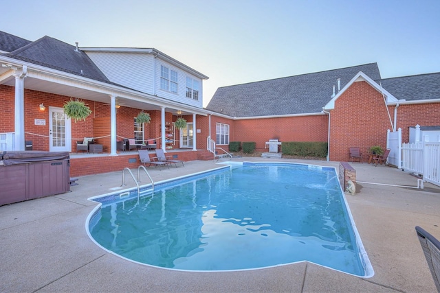 5784 Rock Springs Rd, Smyrna, TN 37167 - view of pool with a hot tub, a patio area, and fence