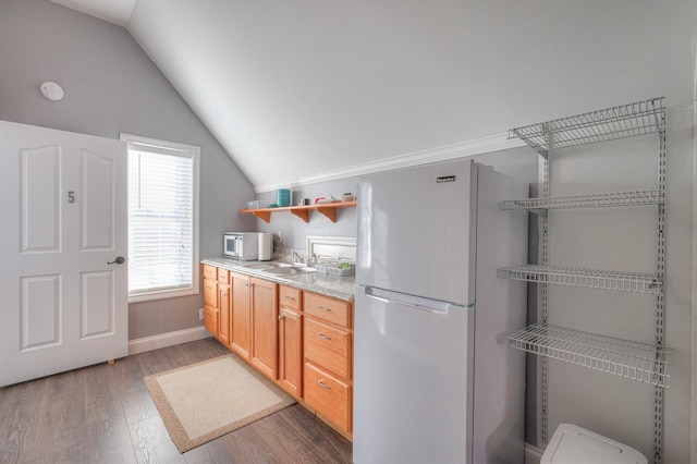 5784 Rock Springs Rd, Smyrna, TN 37167 - kitchen featuring white appliances, open shelves, a sink, vaulted ceiling, and wood finished floors