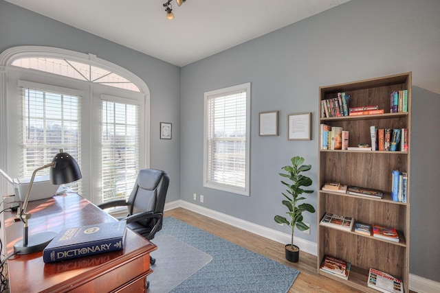 5784 Rock Springs Rd, Smyrna, TN 37167 - home office featuring baseboards and wood finished floors