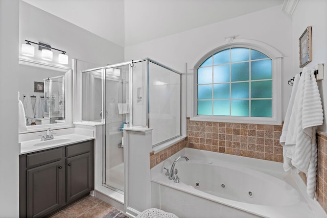 1013 Nealcrest Cir, Spring Hill, TN 37174 - full bathroom featuring a shower stall, vanity, a tub with jets, and tile patterned floors