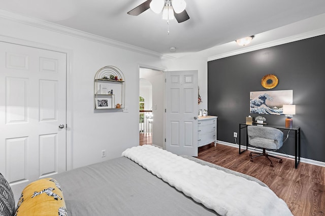 1013 Nealcrest Cir, Spring Hill, TN 37174 - bedroom featuring wood finished floors, arched walkways, ornamental molding, a ceiling fan, and baseboards
