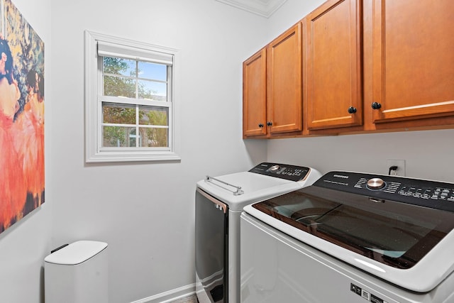 1013 Nealcrest Cir, Spring Hill, TN 37174 - laundry area featuring washer and clothes dryer, cabinet space, baseboards, and crown molding