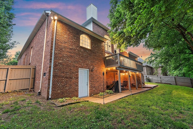 1013 Nealcrest Cir, Spring Hill, TN 37174 - rear view of house with a patio, brick siding, and stairway