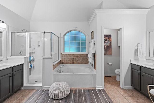 1013 Nealcrest Cir, Spring Hill, TN 37174 - full bathroom featuring a shower stall, lofted ceiling, two vanities, and tile patterned flooring
