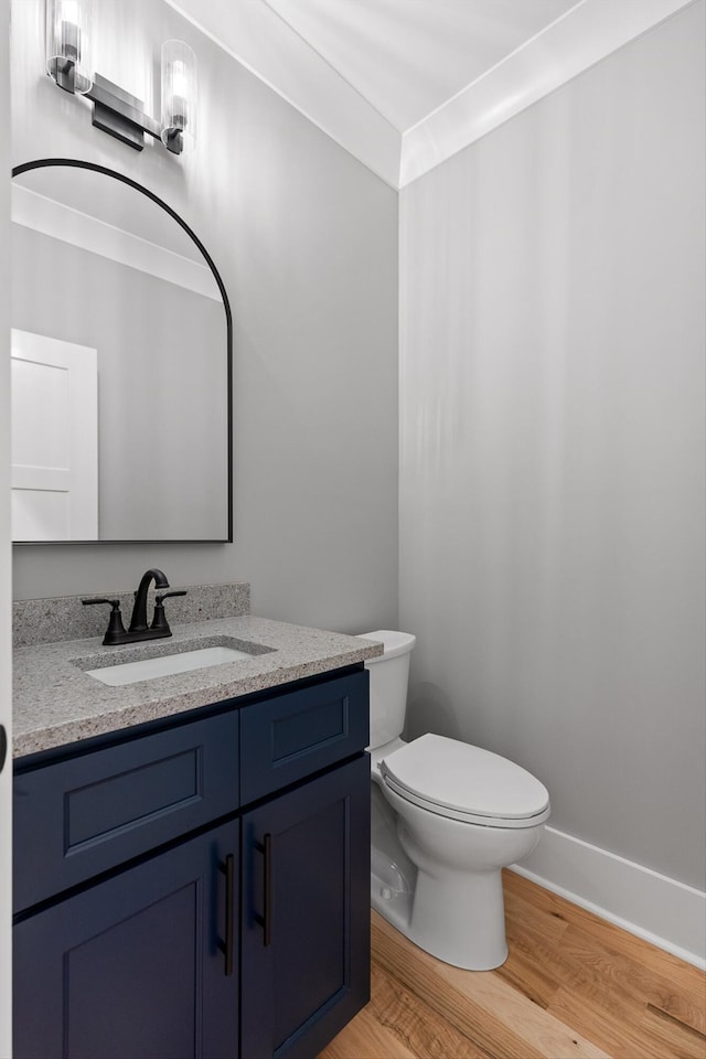 264 Goose Creek Cir, Soddy Daisy, TN 37379 - half bath with wood finished floors, vanity, toilet, and baseboards