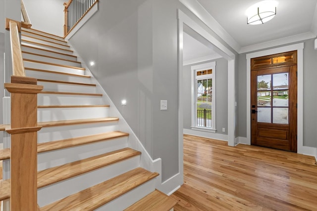 264 Goose Creek Cir, Soddy Daisy, TN 37379 - entrance foyer featuring stairs, wood finished floors, baseboards, and ornamental molding