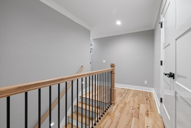 264 Goose Creek Cir, Soddy Daisy, TN 37379 - hallway featuring an upstairs landing, light wood-type flooring, recessed lighting, baseboards, and crown molding