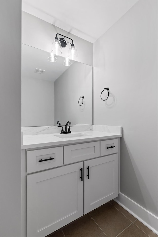264 Goose Creek Cir, Soddy Daisy, TN 37379 - bathroom featuring vanity, tile patterned flooring, and baseboards