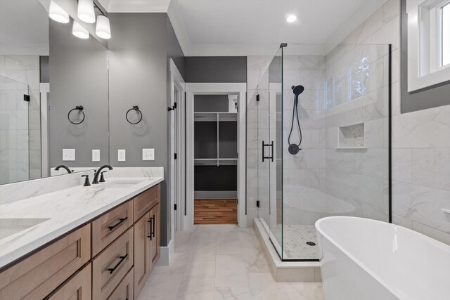 264 Goose Creek Cir, Soddy Daisy, TN 37379 - bathroom with a shower stall, a freestanding tub, marble look tile flooring, double vanity, and a walk in closet