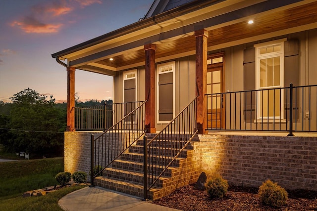 264 Goose Creek Cir, Soddy Daisy, TN 37379 - property entrance with a porch and board and batten siding