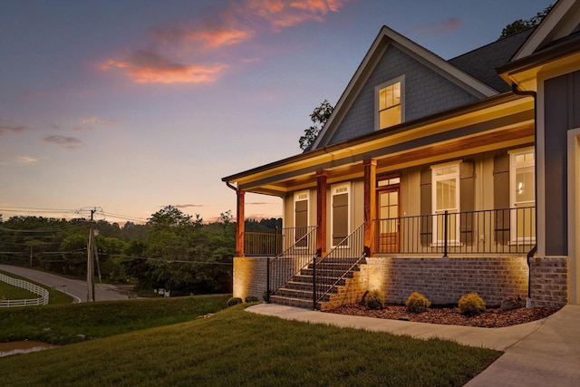 264 Goose Creek Cir, Soddy Daisy, TN 37379 - view of front of property featuring a porch, a front lawn, and stairway