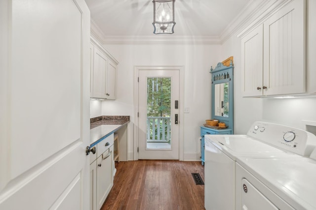 5432 Parker Branch Rd, Franklin, TN 37064 - laundry room with cabinet space, washing machine and clothes dryer, dark wood-style floors, and crown molding
