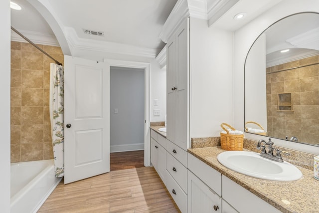 5432 Parker Branch Rd, Franklin, TN 37064 - bathroom with vanity, wood finished floors, recessed lighting, ornamental molding, and shower / bath combination with curtain
