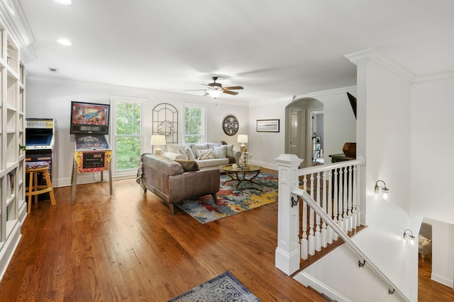 5432 Parker Branch Rd, Franklin, TN 37064 - living room with a ceiling fan, crown molding, wood finished floors, baseboards, and arched walkways