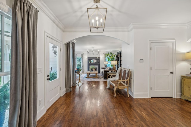 5432 Parker Branch Rd, Franklin, TN 37064 - entrance foyer with a chandelier, arched walkways, ornamental molding, wood finished floors, and baseboards