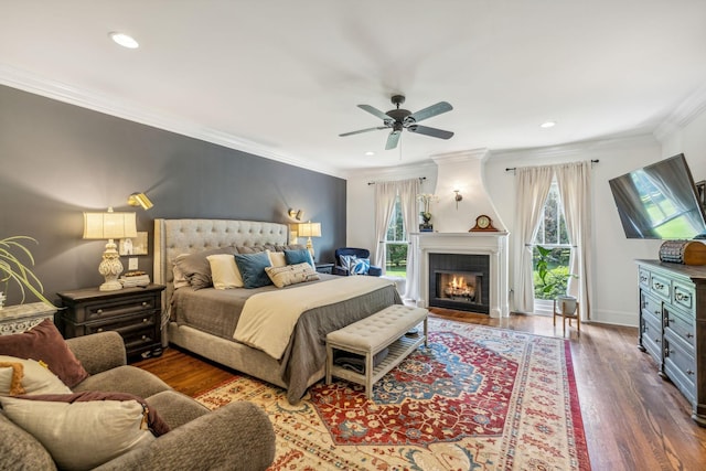 5432 Parker Branch Rd, Franklin, TN 37064 - bedroom with ornamental molding, a large fireplace, wood finished floors, recessed lighting, and ceiling fan