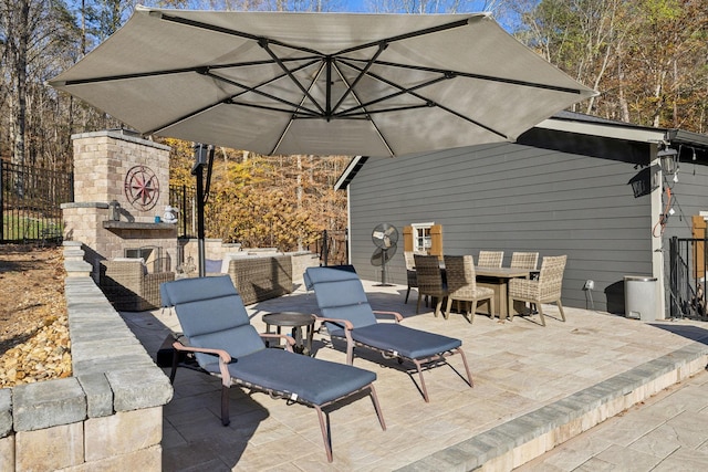 5432 Parker Branch Rd, Franklin, TN 37064 - view of patio / terrace featuring fence, an outdoor living space with a fireplace, and outdoor dining area