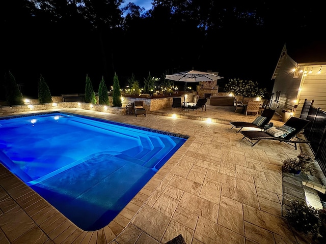 5432 Parker Branch Rd, Franklin, TN 37064 - pool at night featuring a patio area