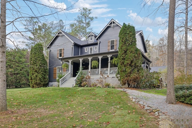 5432 Parker Branch Rd, Franklin, TN 37064 - view of front of house with covered porch and a front lawn