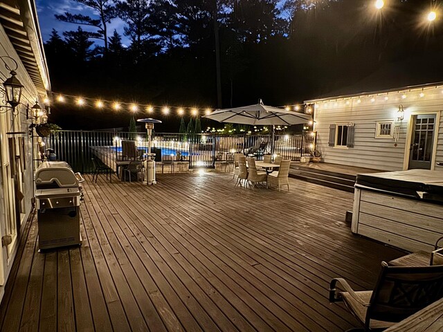 5432 Parker Branch Rd, Franklin, TN 37064 - deck at night with outdoor dining area and area for grilling