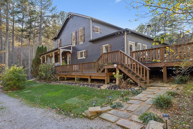 5432 Parker Branch Rd, Franklin, TN 37064 - rear view of house featuring a deck, a lawn, and stairs