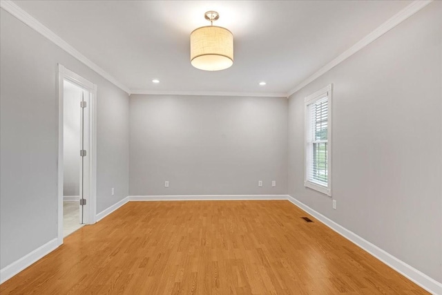 205 Jackson St, Cowan, TN 37318 - unfurnished room featuring crown molding, light wood-type flooring, baseboards, and recessed lighting