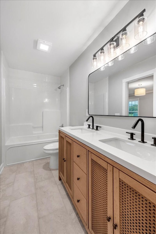 205 Jackson St, Cowan, TN 37318 - bathroom with washtub / shower combination, double vanity, and toilet