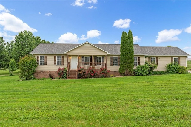 205 Jackson St, Cowan, TN 37318 - ranch-style house with a porch, crawl space, and a front lawn