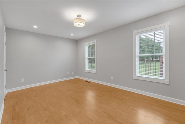 205 Jackson St, Cowan, TN 37318 - unfurnished room featuring light wood-style flooring, baseboards, and recessed lighting