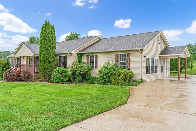 205 Jackson St, Cowan, TN 37318 - single story home featuring driveway, a shingled roof, a front lawn, and a porch