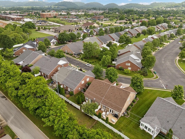 aerial view of residential area with mountains
