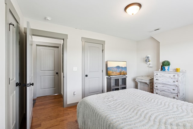 706 Kirbytown Rd, Lafayette, TN 37083 - bedroom with wood finished floors and baseboards