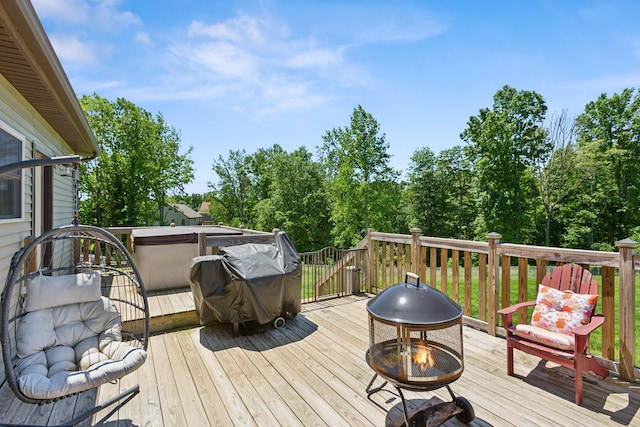 706 Kirbytown Rd, Lafayette, TN 37083 - wooden deck with a fire pit