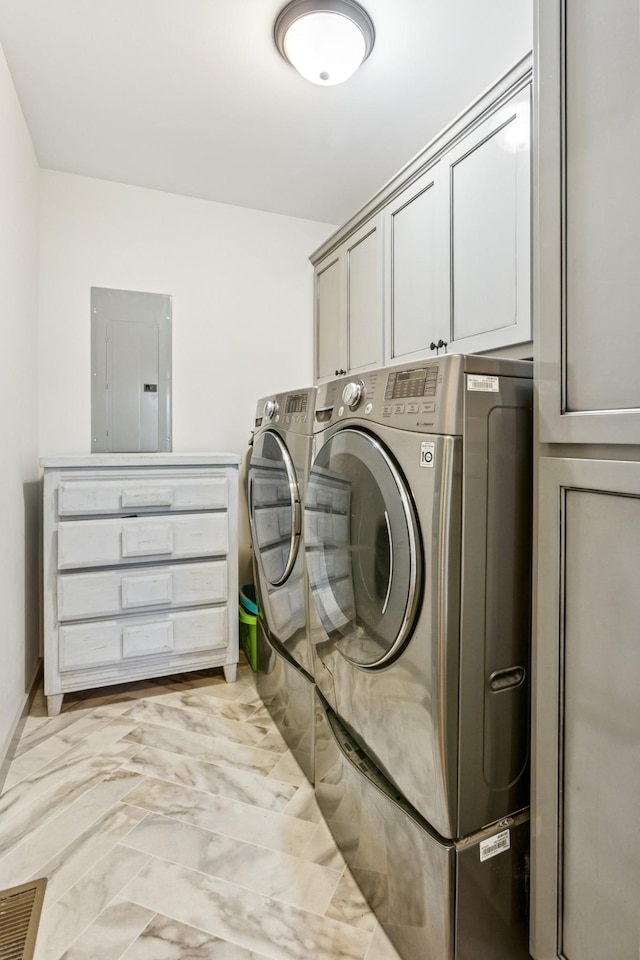 706 Kirbytown Rd, Lafayette, TN 37083 - washroom featuring electric panel, washer and clothes dryer, cabinet space, and light marble finish floors
