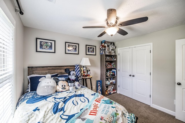 1461 Round Rock Dr, Murfreesboro, TN 37128 - carpeted bedroom featuring multiple windows, a closet, ceiling fan, and baseboards