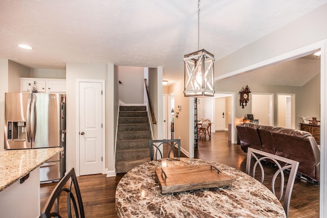 1461 Round Rock Dr, Murfreesboro, TN 37128 - dining space with dark wood finished floors, baseboards, stairs, and recessed lighting