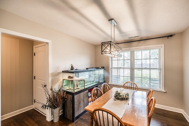 1461 Round Rock Dr, Murfreesboro, TN 37128 - dining area with baseboards, dark wood-style floors, a chandelier, and a textured ceiling