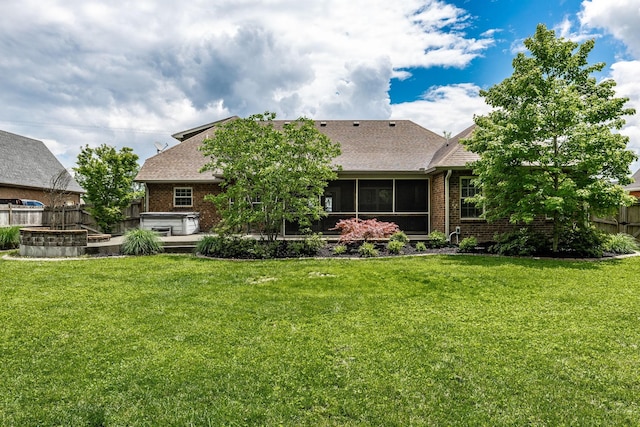1461 Round Rock Dr, Murfreesboro, TN 37128 - rear view of house with brick siding, a hot tub, a shingled roof, and a sunroom