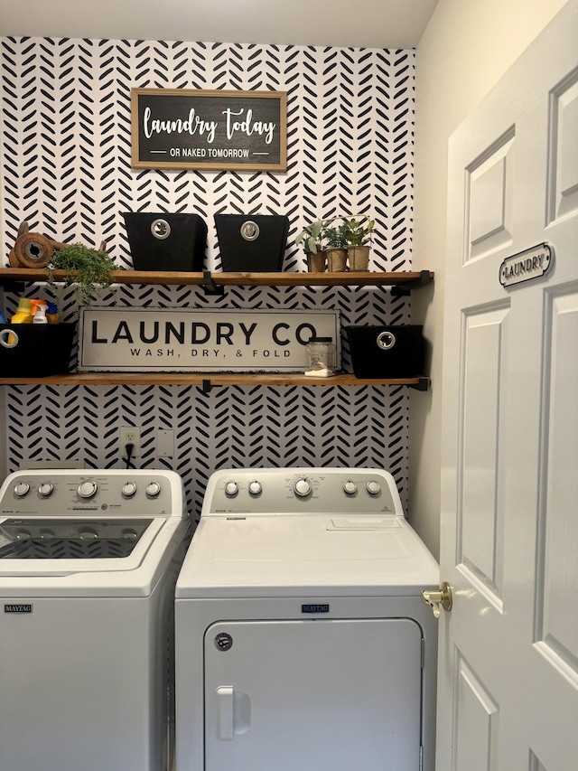 laundry room with independent washer and dryer