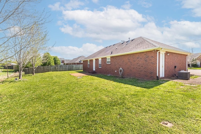 7004 Westfork Dr, Smyrna, TN 37167 - view of property exterior featuring brick siding, central AC, and roof with shingles