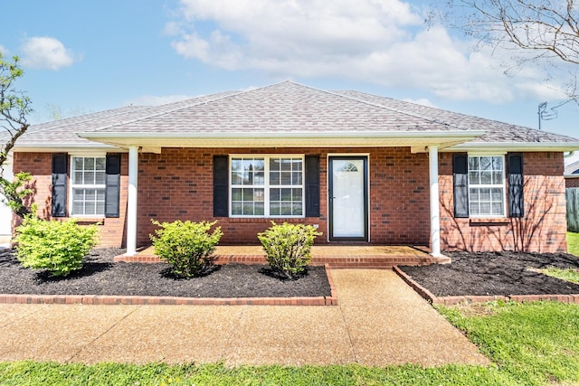 7004 Westfork Dr, Smyrna, TN 37167 - ranch-style home with covered porch, roof with shingles, and brick siding