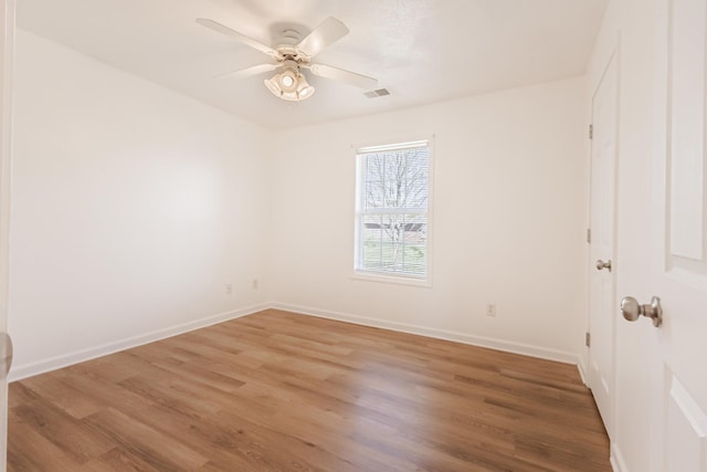 7004 Westfork Dr, Smyrna, TN 37167 - spare room with light wood-type flooring, a ceiling fan, and baseboards