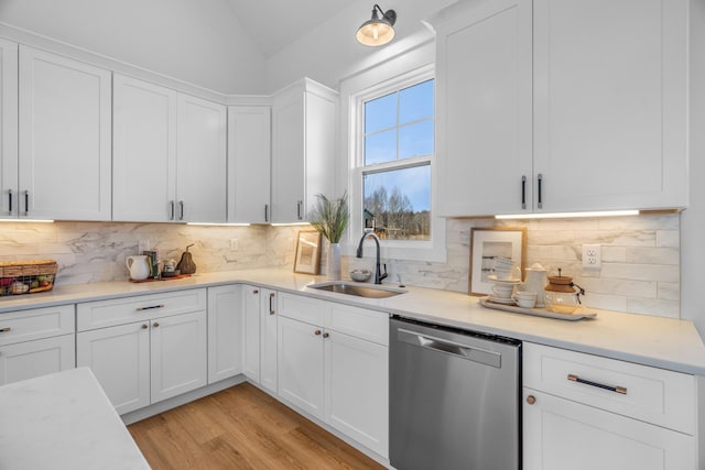 4455 Knox Ln, Cookeville, TN 38506 - kitchen featuring dishwasher, a sink, light countertops, white cabinetry, and lofted ceiling