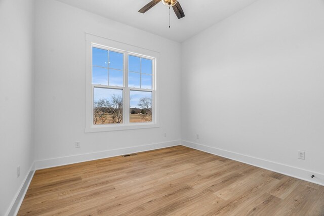 4455 Knox Ln, Cookeville, TN 38506 - spare room featuring ceiling fan, baseboards, and light wood-style floors