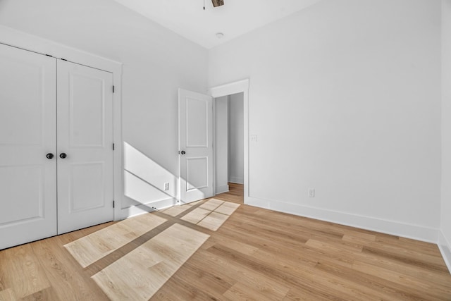4455 Knox Ln, Cookeville, TN 38506 - unfurnished bedroom featuring light wood-style flooring, baseboards, and a closet