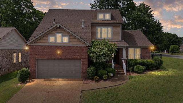 3045 Cairns Dr W, Mount Juliet, TN 37122 - view of front of property featuring driveway, a garage, brick siding, a lawn, and roof with shingles