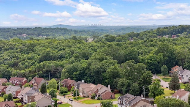 3045 Cairns Dr W, Mount Juliet, TN 37122 - aerial perspective of suburban area with a heavily wooded area
